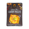 Packaging of Siam Yellow Thai Curry Paste on a white background